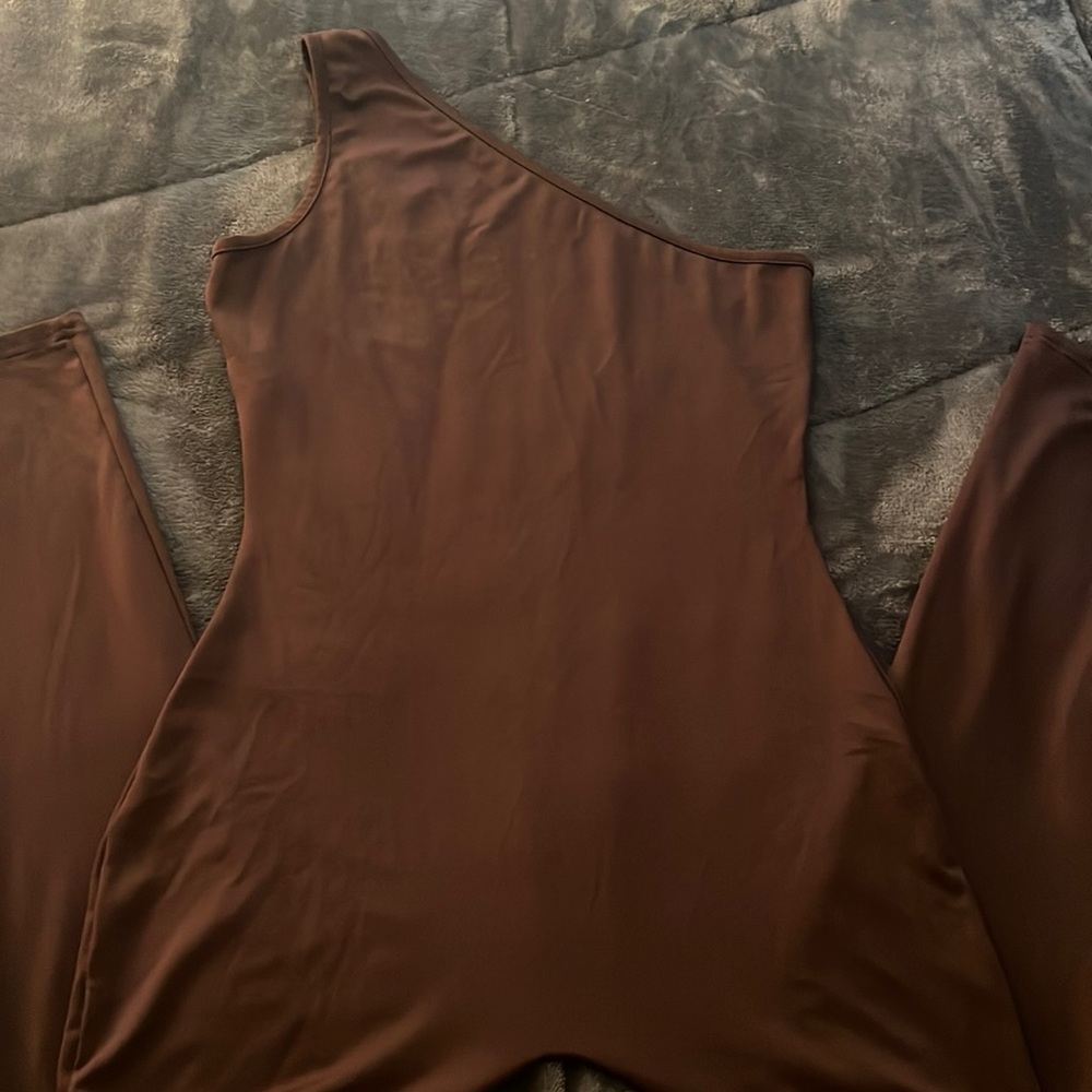 Brown body suit